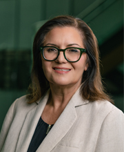 A portrait of Kelly Sims